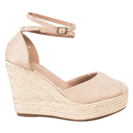 Queentina Espadrile elegante pe o pană înaltă bej Queentina Espadrile elegante pe o pană înaltă bej