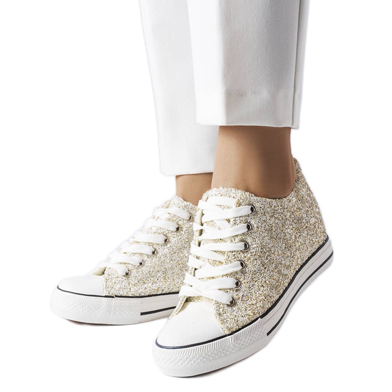 Tenisi aurii cu pană joasă de la Garceau de aur