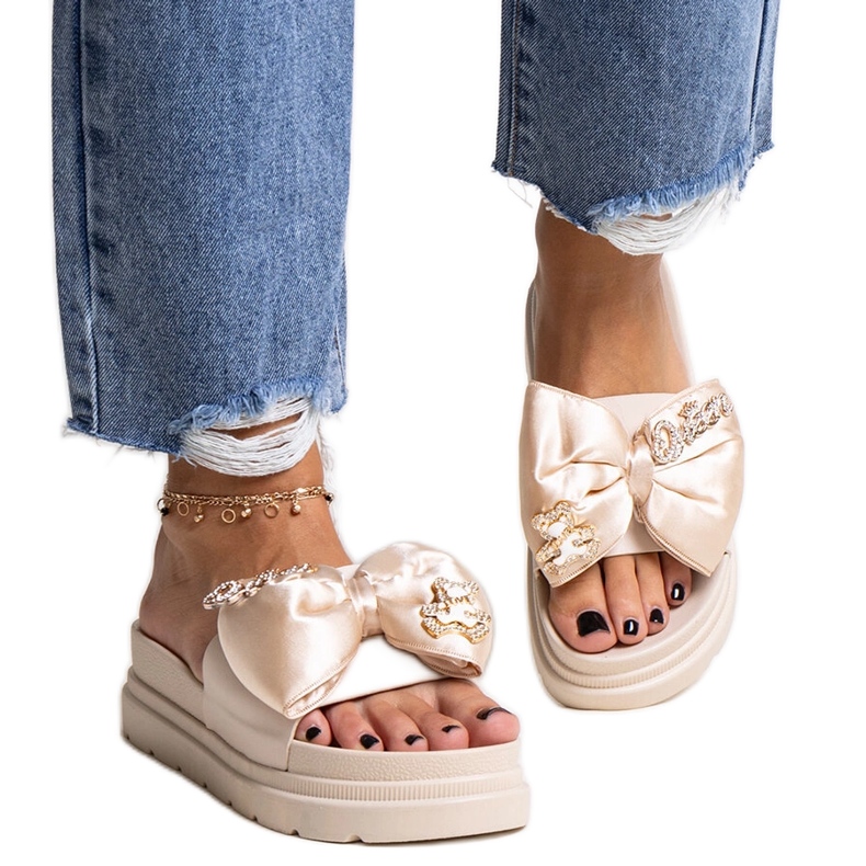 Flip-flops masivi de culoare bej cu o fundita, izsa Flip-flops masivi de culoare bej cu o fundita, izsa