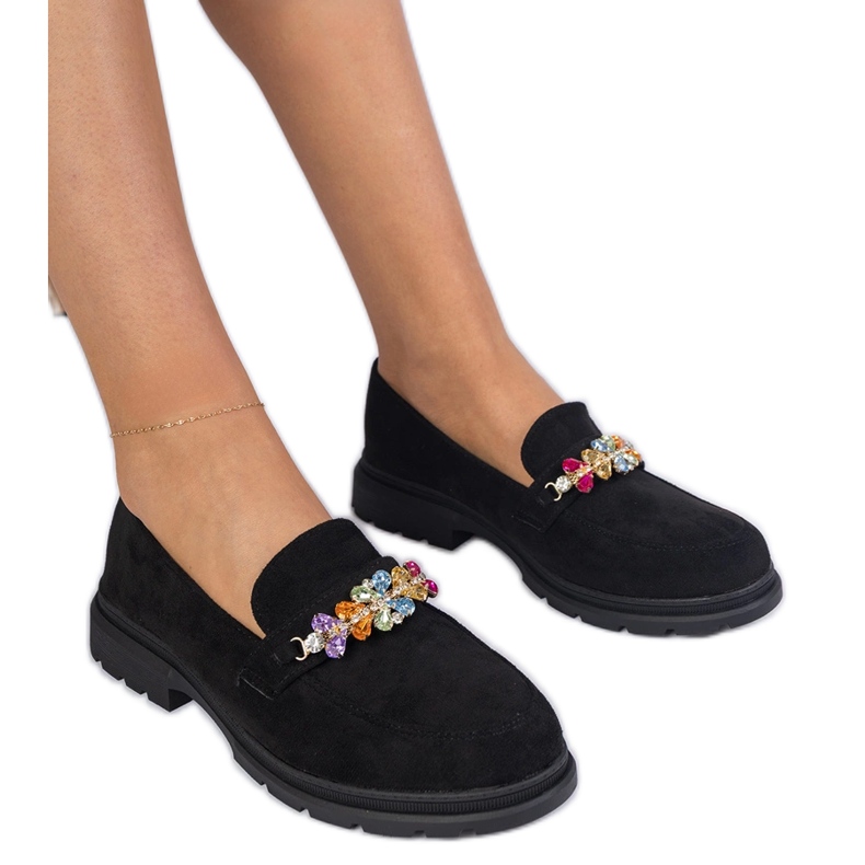 Plăcile de femei negre decorate cu pietre negru Plăcile de femei negre decorate cu pietre negru