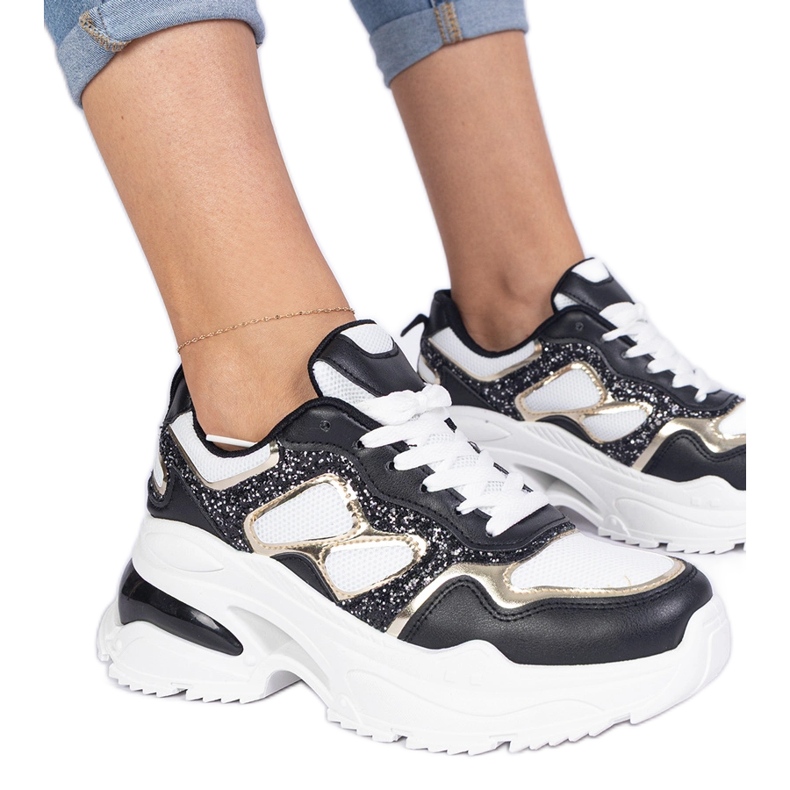 Adidatoarele de femei negre decorate cu sclipici negru