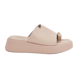 Flip -flops pentru femei pe platformă și panouri joase cu detalii decorative bej