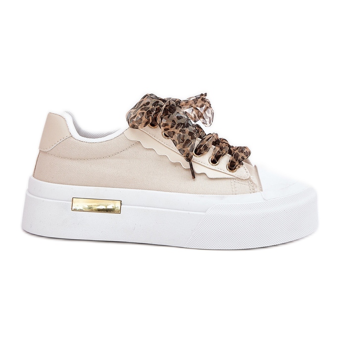 Adidași pentru femei pe o platformă masivă cu bej decorativ de dacing