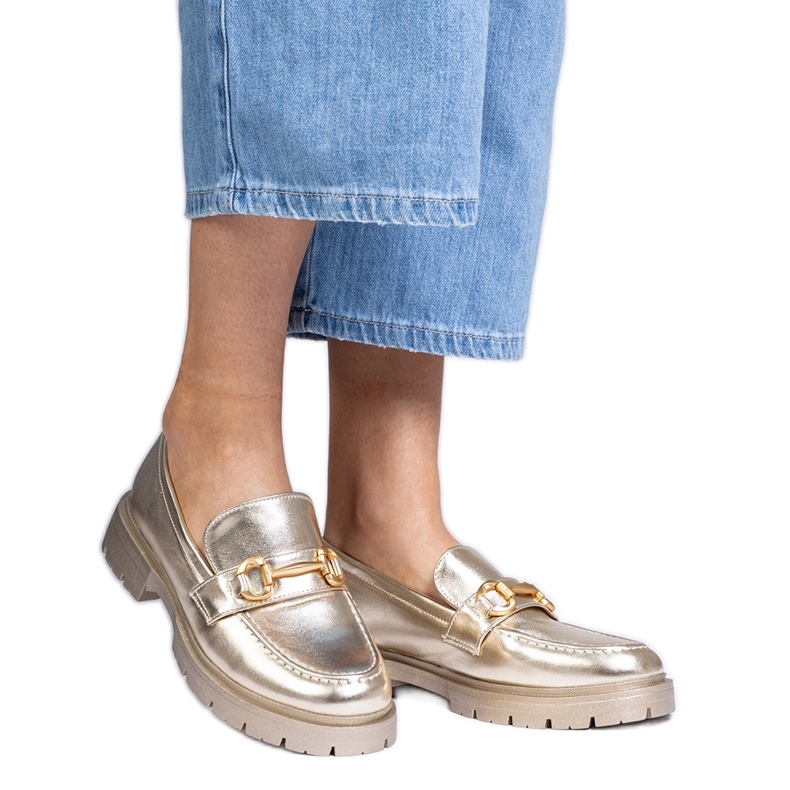 Plăcile elegante de aur cu decorare