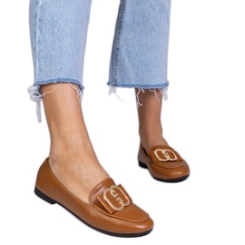 Plăcile de femei maro cu un decor auriu