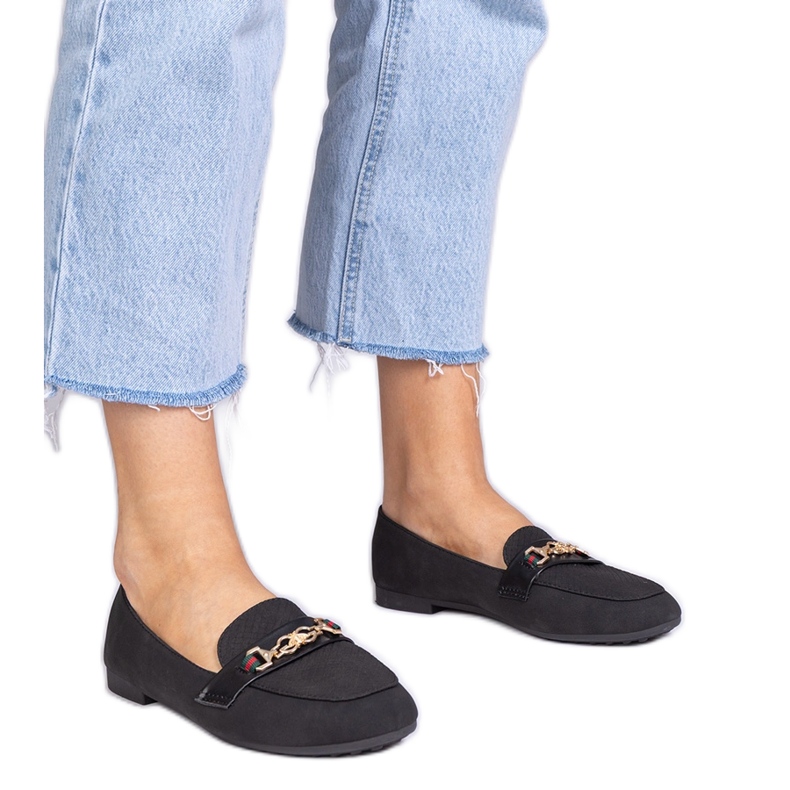 Pârâie neagră cu un finisaj mat cu un decor de aur negru