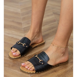 Flip -flop -uri plate negre cu un decor auriu negru Flip -flop -uri plate negre cu un decor auriu negru