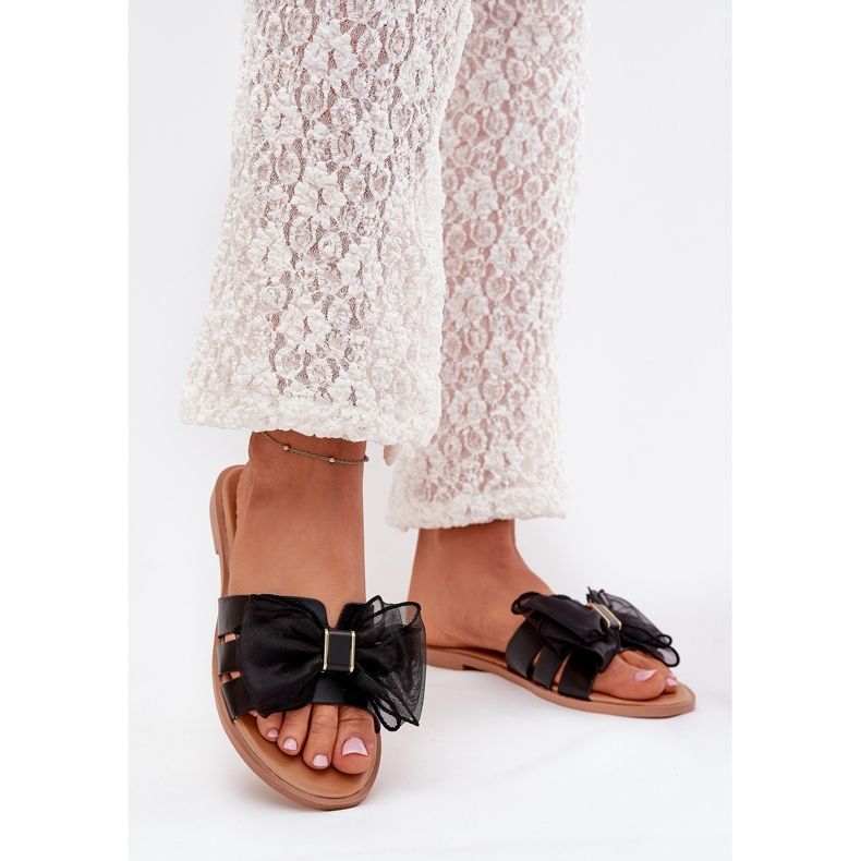 Boto Flip -flops pentru femei cu un tanira negru cu arc negru