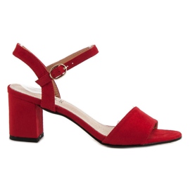 Evento Sandale pe o bară roșu