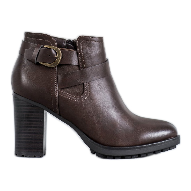 Super Mode Cizme elegante pe un post maro