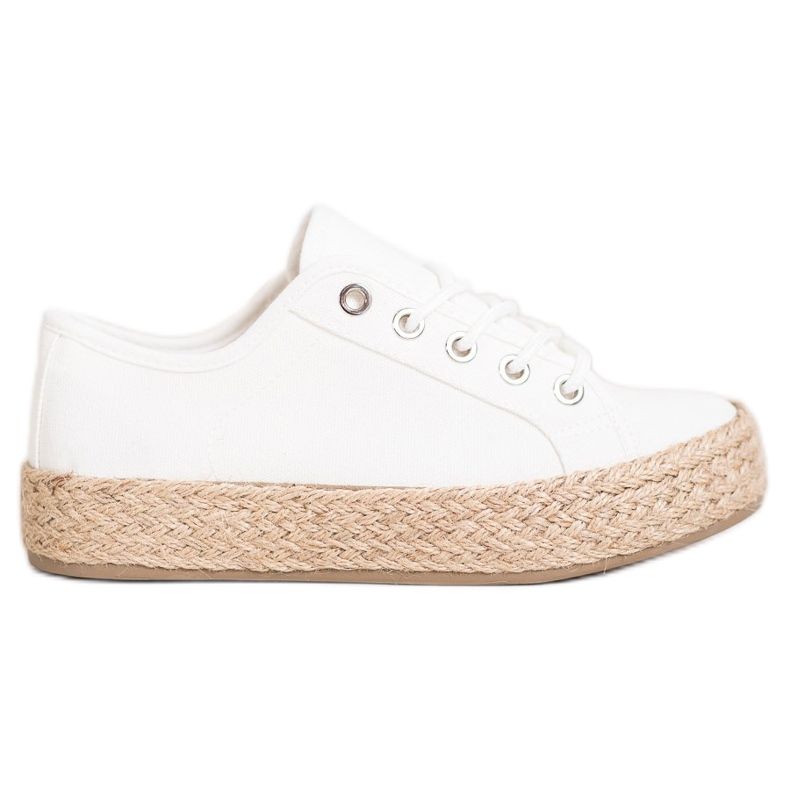 Kylie Adidași pe o platformă de paie alb