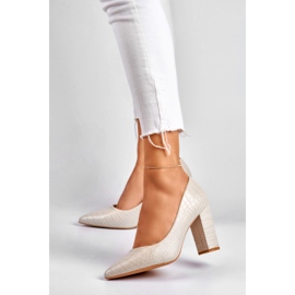 Pompe strălucitoare pe un stâlp din piele ecologică gri 2