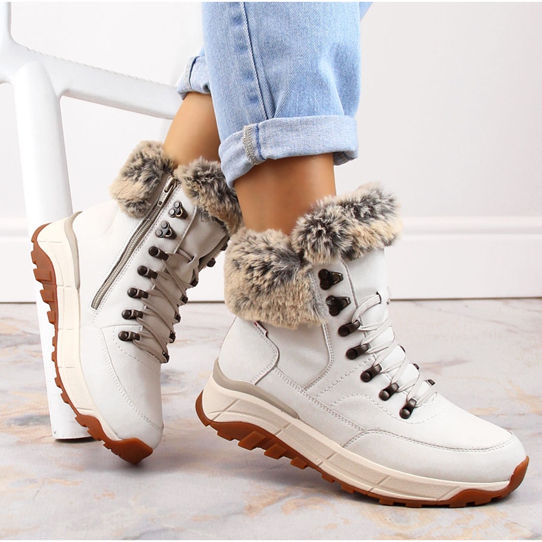 Botine de damă impermeabile din piele, izolate cu lână, alb Rieker W0063-80 1 Botine de damă impermeabile din piele, izolate cu lână, alb Rieker W0063-80 1