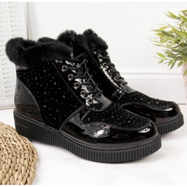 Cizme negre Rieker 93312-00 din piele izolată pe platformă negru 1