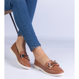 Plăcile maro decorate cu un arc și un ursuleț de aur auriu 1