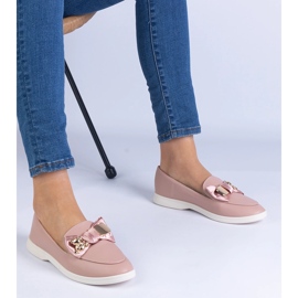 Plăcile roz decorate cu un arc și un ursuleț de aur auriu 1 Plăcile roz decorate cu un arc și un ursuleț de aur auriu 1