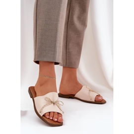 Tălpile plate cu un arc decorativ bej 2 Tălpile plate cu un arc decorativ bej 2