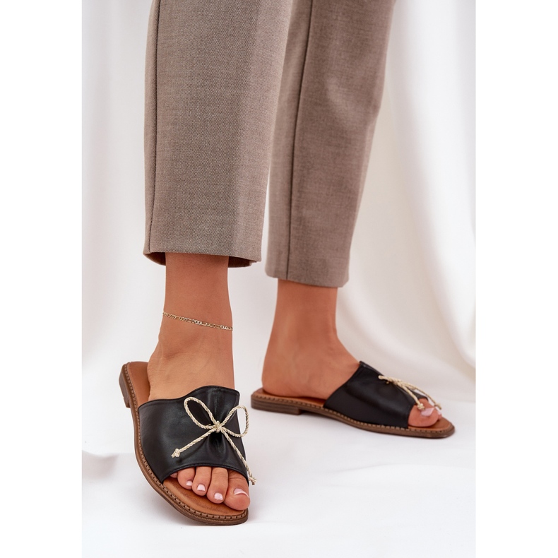 Flip -flops cu talpă plat cu un arc decorativ negru 2