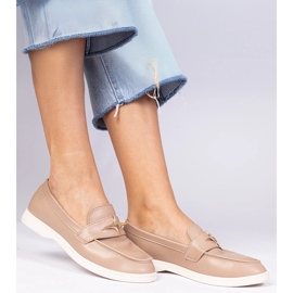 Plăcile pentru femei întunecate cu o decorare de aur bej 2