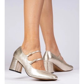 Pompe de femei aurii pe stâlp cu catarame de aur 1