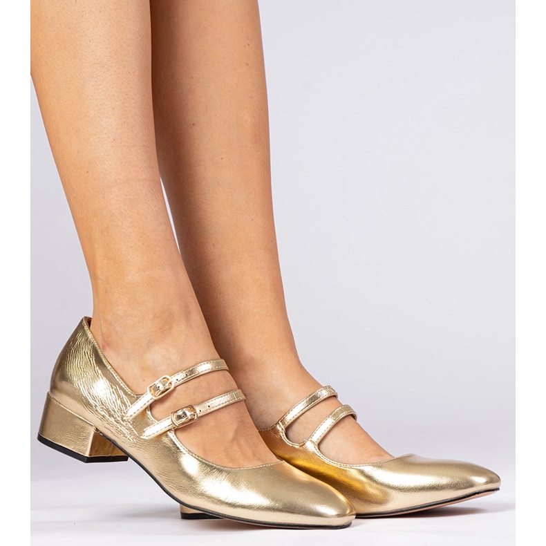 Pompe de femei aurii pe stâlp cu catarame de aur 1