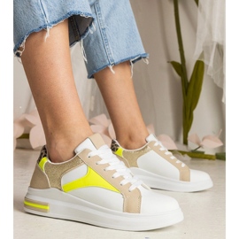 Adidașii pentru femei albe cu adăugarea de sclipici și leoparde 1