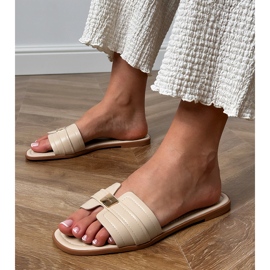 Flip -flops pentru femei bej cu un ornament pe curea 1
