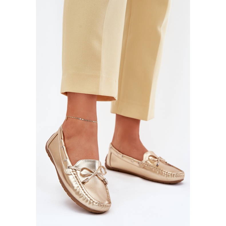 Plăcile de aur din piele eco -feminină cu un arc 2