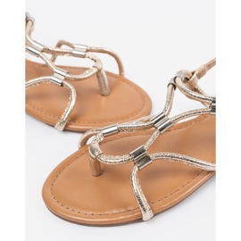 Sandalele pentru femei flip -flops cu dungi decorative de aur 1