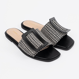 Goodin Flaps Tedeed pe o talpă alb -negru plat 2