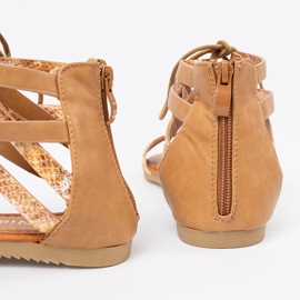 Shelvt Dantelă sanadals -up cu un motiv de șarpe 1