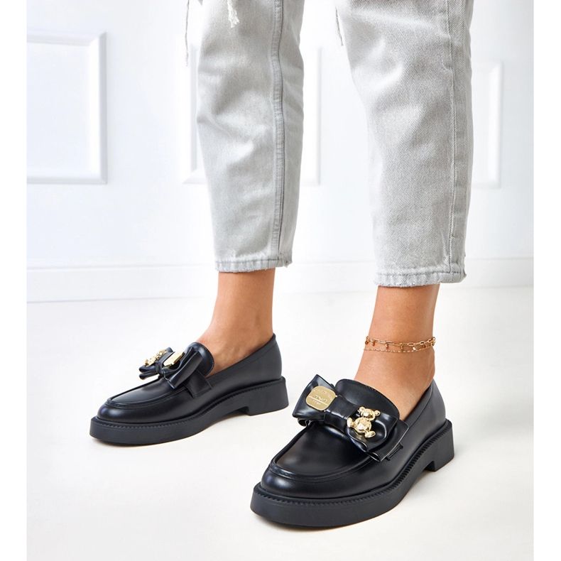 Plăceri negri cu un arc și tedy ursuleț negru 1