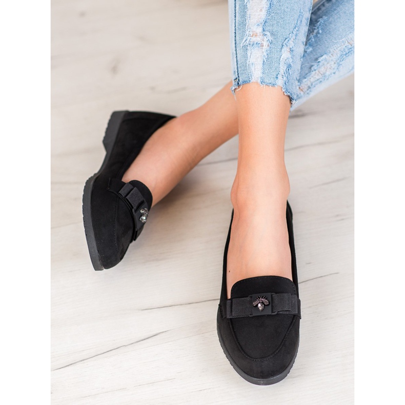 Miss Laura Domnii cu arc decorativ negru 1