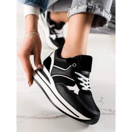 TRENDI Negru se furișează pe platformă 1