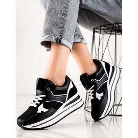 TRENDI Negru se furișează pe platformă 2