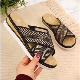 Papuci de damă negri pe toc pană Rieker 679A5 bej maro 1 Papuci de damă negri pe toc pană Rieker 679A5 bej maro 1