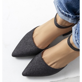 Pompe negre strălucitoare pe postul Mawahi negru 1